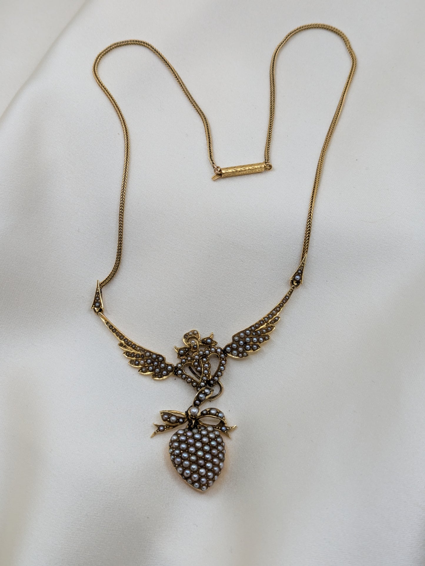 Incredible Edwardian 15k split pearl winged heart locket necklace, dynamic!