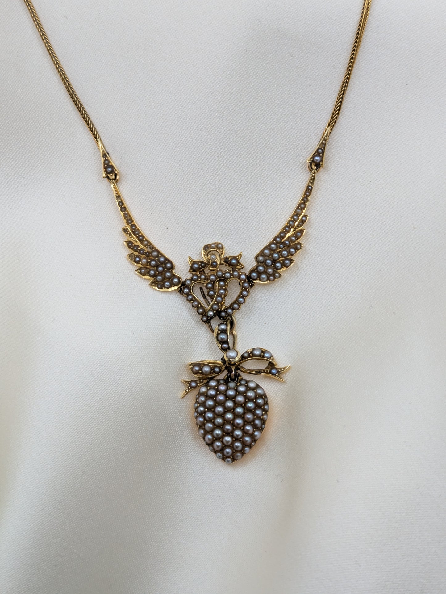 Incredible Edwardian 15k split pearl winged heart locket necklace, dynamic!